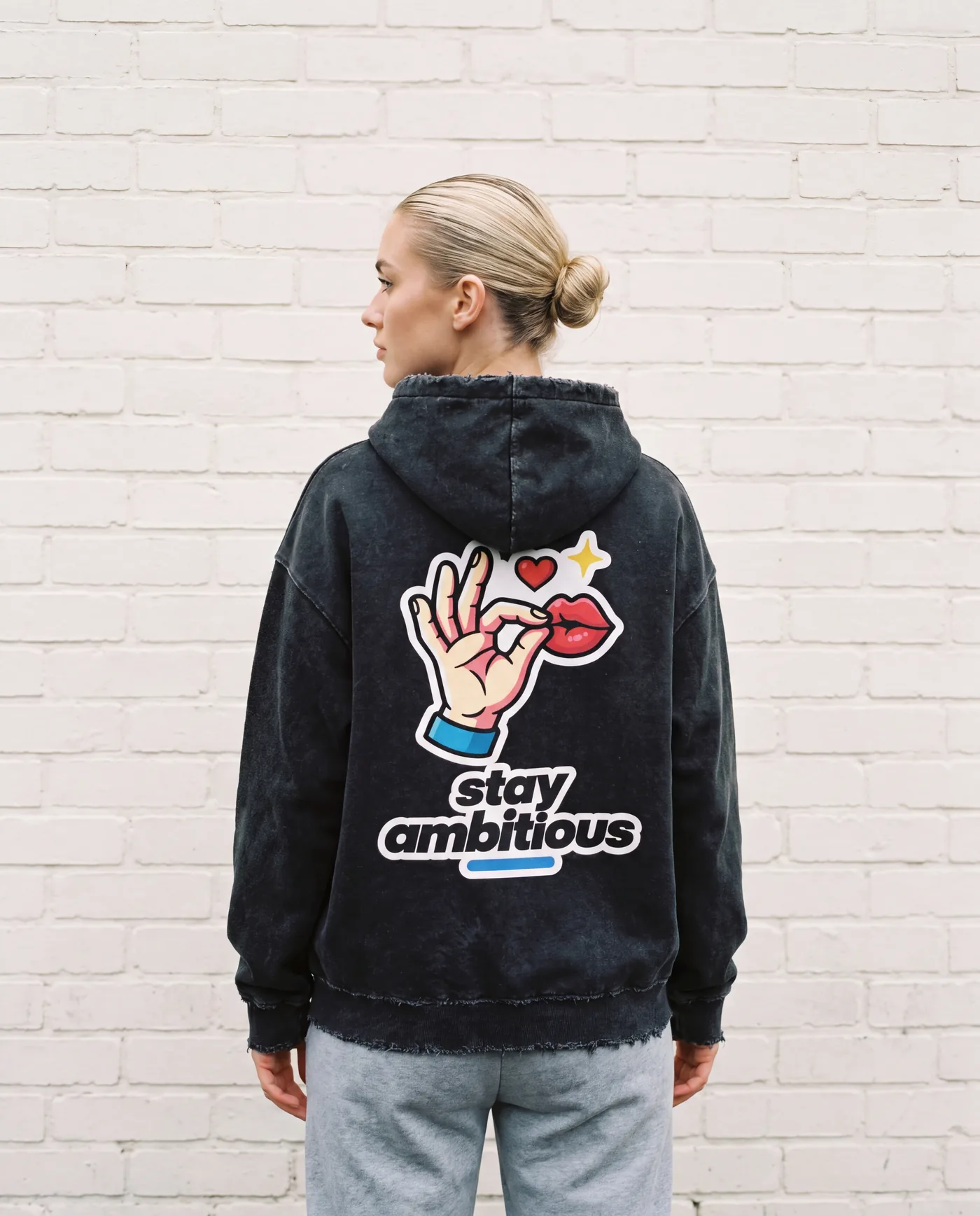 Chef’s Kiss hoodie worn by a model